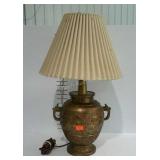 Metal based table lamp with shade, some stains on