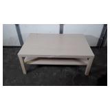 Blonde coffee table with bottom shelf, seller