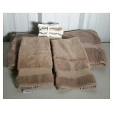 Two bath towels, two hand towels and seven