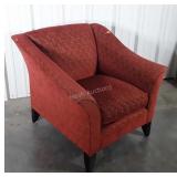 Red upholstered living room chair, does have