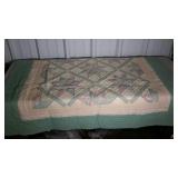 Twin sized, star patterned quilt. Needs cleaning.
