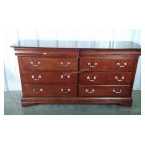 mahogany dresser has two over six drawers, 68"