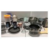 Large tote of kitchenware- strainers, cake lane,