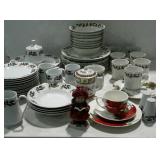 Group of Christmas plates, shakers,  cups, figure