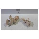 2 Piano baby figures