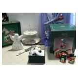 Blue tote with Christmas items including Santa at
