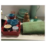 Kitchenware lot with placemats, casserole dishes,
