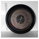 Battery operated wall clock, 23" in diameter
