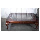 Queen Anne footed glass top coffee table 54 by 40