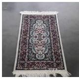 Multi colored hallway runner, is 43" long by 23"