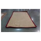 Rug, red border Burlap all weather type rug.