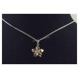 Sterling silver necklace with floral pendant 18in