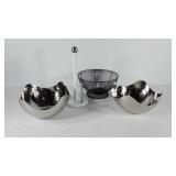 Modern styled kitchenwares, fruit bowls and paper