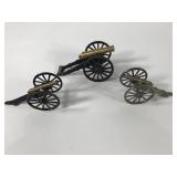 Mini cannons, one is marked Virginia and the