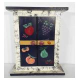 Wooden cabinet with hinged doors. Can sit or