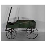 Wooden wagon with metal wheels and handle. Wagon