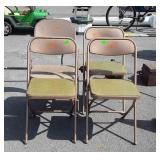 Four metal Folding Chairs, 3 matched one odd.