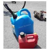 Two Fuel Containers. 5 gallon Kerosene mostly