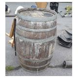 Wooden Whiskey Barrel, has been fixed with water