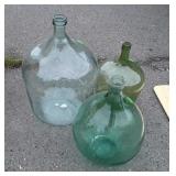 Three big Glass Wine Bottles