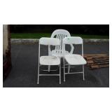 3 white poly chairs,  2 match and fold