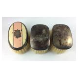 Three Sterling brushes