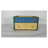 Painted wooden crate. Measures 18x10x12 inches.