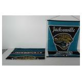 Jacksonville Jaguars banner and outdoor flag.