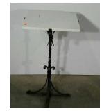 Wrought iron stand with marble top. 18"×18"×32".