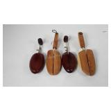 Four wooden shoe stretchers