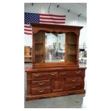 Two piece dresser and mirrored, lighted hutchtop.