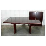 Dining table, made in Denmark, includes two