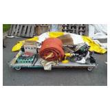 Skid of rechargeable drill, saw, car wash brush,