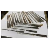 25 letter openers, some discolored