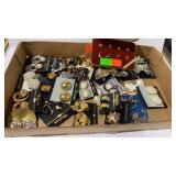 Flat of costume earrings and necklace charms