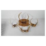 Taxidermy antlers, one set mounted on wood,