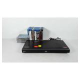 Blu-ray disc player (powers up) and Blu-rays,