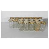 19 quart sized canning jars with lids. All are