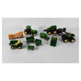John Deere toy tractors, trucks four wheelers,