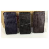 Case of 18 wallets purple, black, and