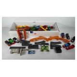 Box of Thomas the train tracks, cars, and