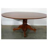 Cherry oval dining table with pedestal base. Nice