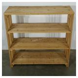 Open pine shelving. Great for laundry room or