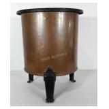 Repurposed copper cauldron as end table. Missing