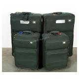 Four matching pieces of American Tourister