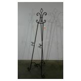 Freestanding easel. 66" high.