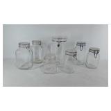 Group of canisters, all with lids, 11.5" tall to