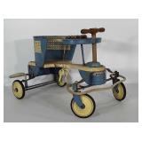 Vintage Taylor-Tot metal and wood baby scooter.