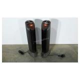 Two Ionic Breeze air purifiers. Both light up,