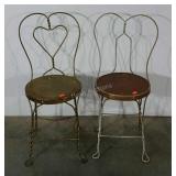 Unmatched pair of ice cream parlor chairs.